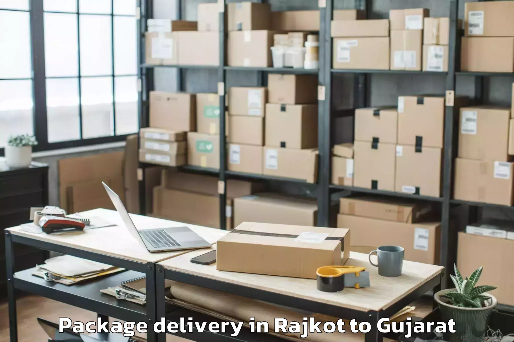 Quality Rajkot to Gujarat University Ahmedabad Package Delivery